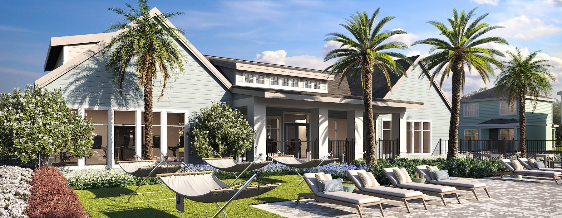 a patio with chairs and palm trees