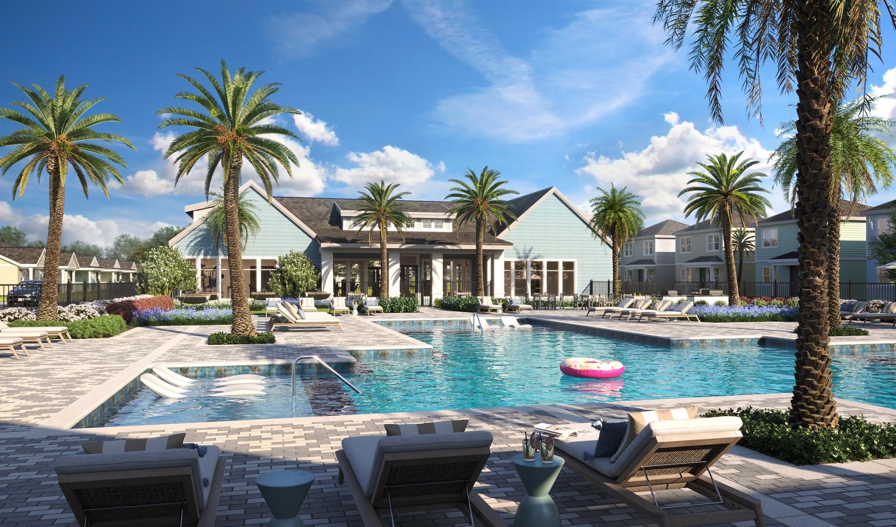 a pool with palm trees and a building in the background