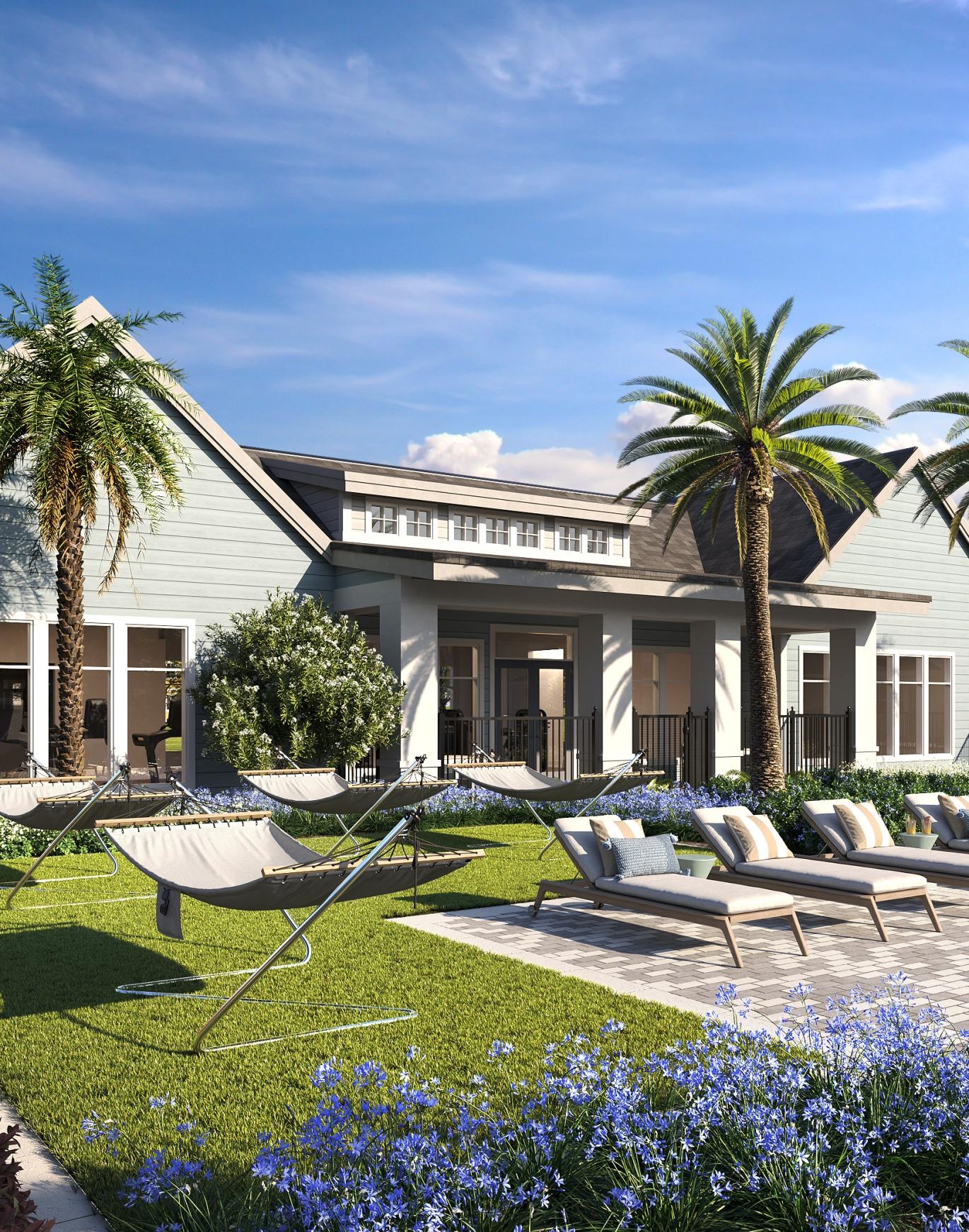 a patio with chairs and palm trees